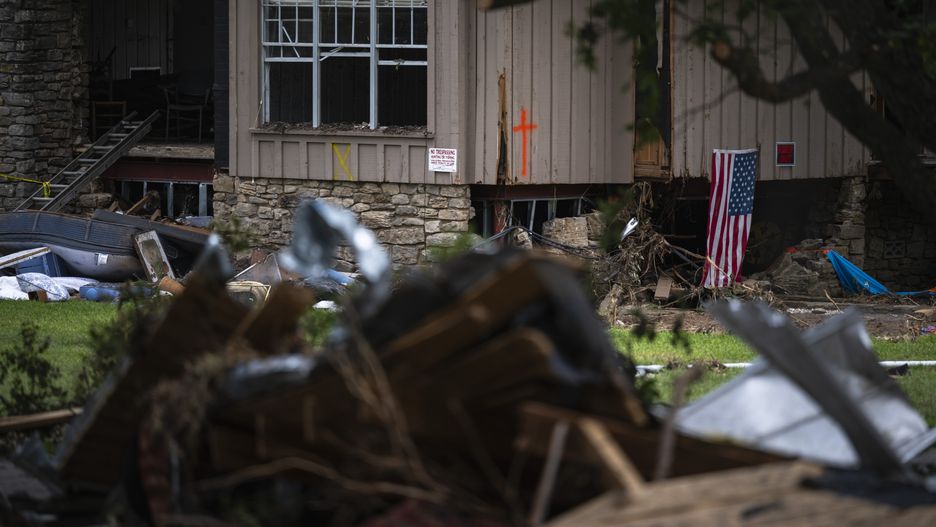 A damaged home following the flood in Hunt, Texas, US, on Wednesday, July 9, 2025. Crews in central Texas are digging through massive piles of debris, overturned vehicles and shattered homes for a sixth day as the search continues for victims of flash floods that killed more than 100 people over the Fourth of July weekend. Photographer: Eli Hartman/Bloomberg via Getty Images