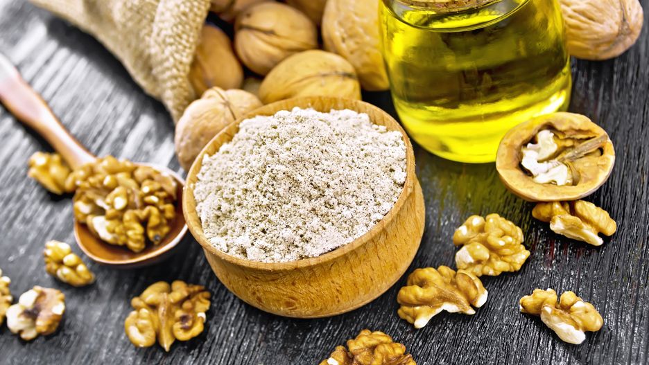 Walnut flour in bowl, nuts on a table, in a spoon and in a bag, oil in glass jar on black wooden board backgroundkostrezflour, oil, seed, walnut, core, oilplant, nut, food, kernel, spoon, bowl, nutrition, jar, glass, ingredient, baking, nature, eating, culinary, meal, diet, fruit, peeled, healthy, snack, plant, freshness, cooking, vegetarian, calorie, energy, organic, protein, dry, vitamin, natural, fresh, nutshell, whole, shell, bag, burlap, wooden, table, crop, board, horizontal, nobody, indoors, color