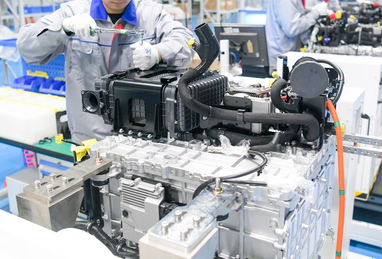 LUOYANG, CHINA - NOVEMBER 15: Workers assemble hydrogen fuel cell engines at Hynamo New Energy Technology Co., Ltd. on November 15, 2024 in Luoyang, Henan Province of China. (Photo by Zhang Yixi/VCG via Getty Images)