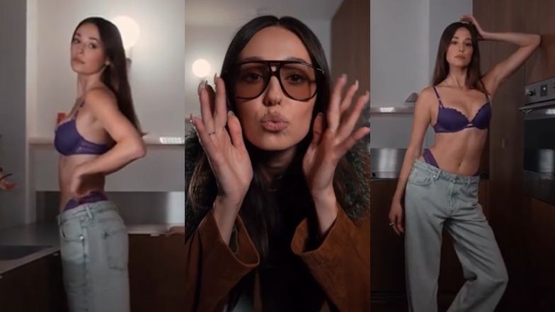 Izabella Krzan prezentuje bieliznę, pozując w kuchni