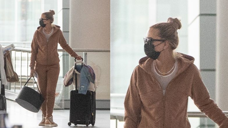 Sandra Kubicka w kapturze i okularach przeciwsłonecznych ukrywa się przed fanami (?) na lotnisku