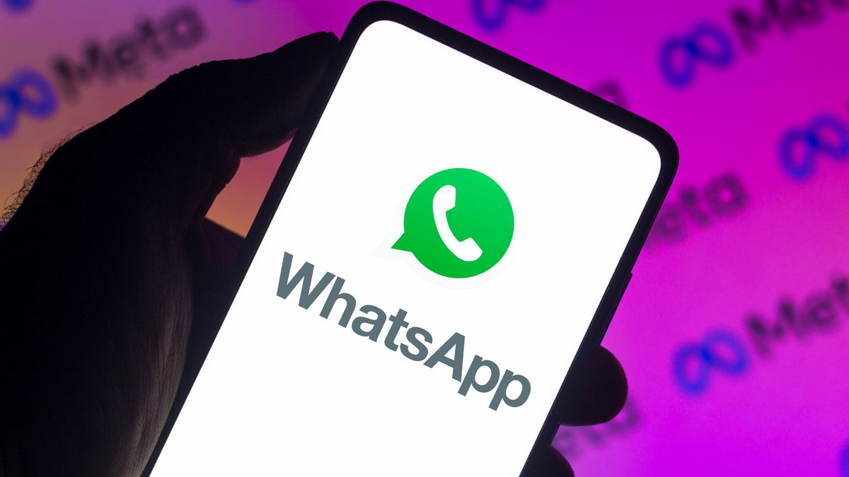 BRAZIL - 2021/12/13: In this photo illustration a WhatsApp logo seen displayed on a smartphone with a Meta Platforms logo in the background. (Photo Illustration by Rafael Henrique/SOPA Images/LightRocket via Getty Images)