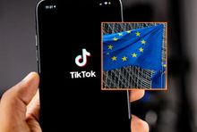 TikTok na smartfonie i flaga Unii Europejskiej
