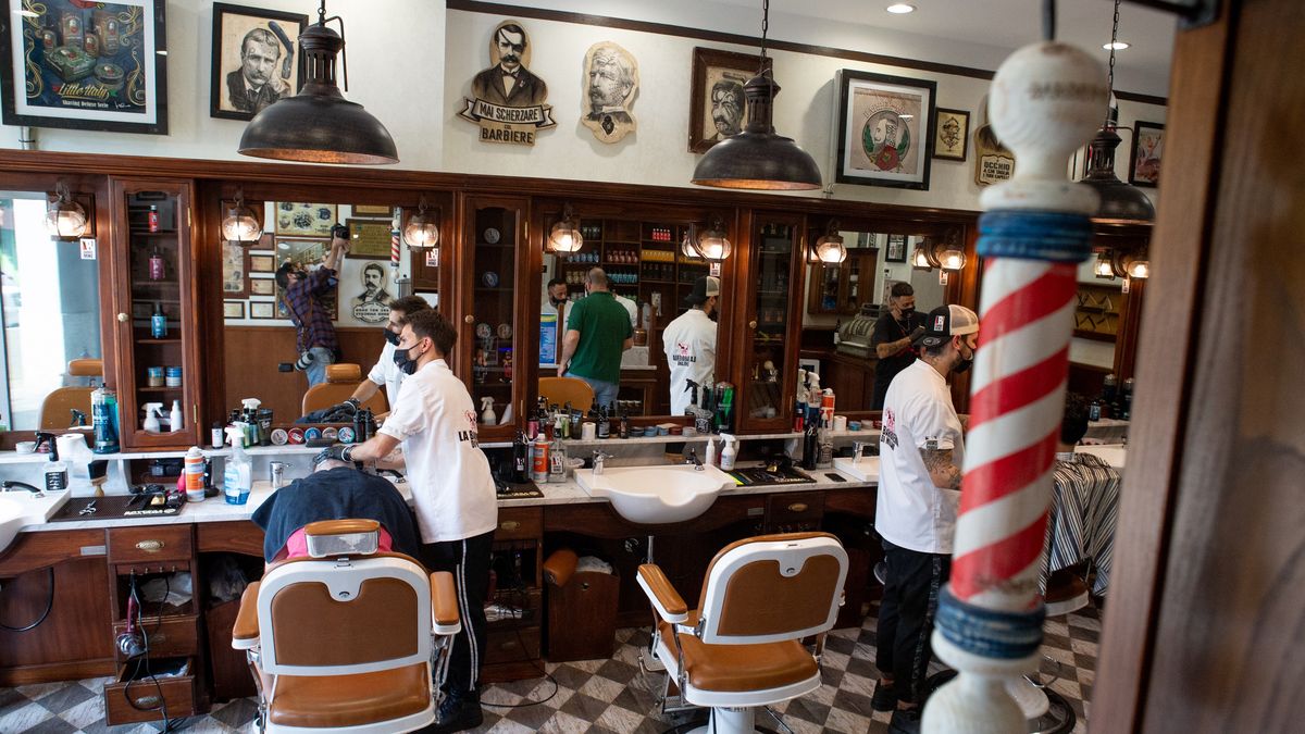 Italy On Phase 2: Reopenings Countrywide As Coronavirus Infection Rate Falls
BUCCINASCO MILAN, ITALY - MAY 18: La Barbieria barber shop and hairdresser cuts hair on the first day of opening after the lockdown on May 18, 2020 in Milan, Italy. Restaurants, bars, cafes, hairdressers and other shops have reopened, subject to social distancing measures, after more than two months of a nationwide lockdown meant to curb the spread of Covid-19. (Photo by Roberto Finizio/Getty Images)
Roberto Finizio