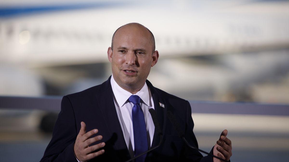 Naftali Bennett, Israel's prime minister, speaks during an event at Ben Gurion International Airport in Tel Aviv, Israel, on Tuesday, June 22, 2021. Israel's new coalition will govern with the slimmest majorities -- commanding 61 of parliaments 120 seats -- and runs the gamut of Israeli politics: secular and religious factions, hawks and doves, free marketeers and social democrats, and an Arab party for the first time in Israeli history. Photographer: Kobi Wolf/Bloomberg via Getty Images