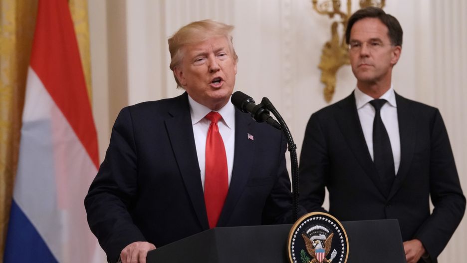 WASHINGTON, DC - JULY 18:   U.S. President Donald Trump (L) delivers remarks with Dutch Prime Minister Mark Rutte during a ceremony where a flag from D-Day was donated to the Smithsonian in the East Room of the White House July 18, 2019 in Washington, DC. The American flag, which was flown on the stern of the boat that led the first U.S. troops onto Utah Beach on D-Day, was purchased by Dutch businessman and art collector Bert Kreuk bought the flag for $514,000 at an auction in Dallas in 2016. (Photo by Chip Somodevilla/Getty Images)