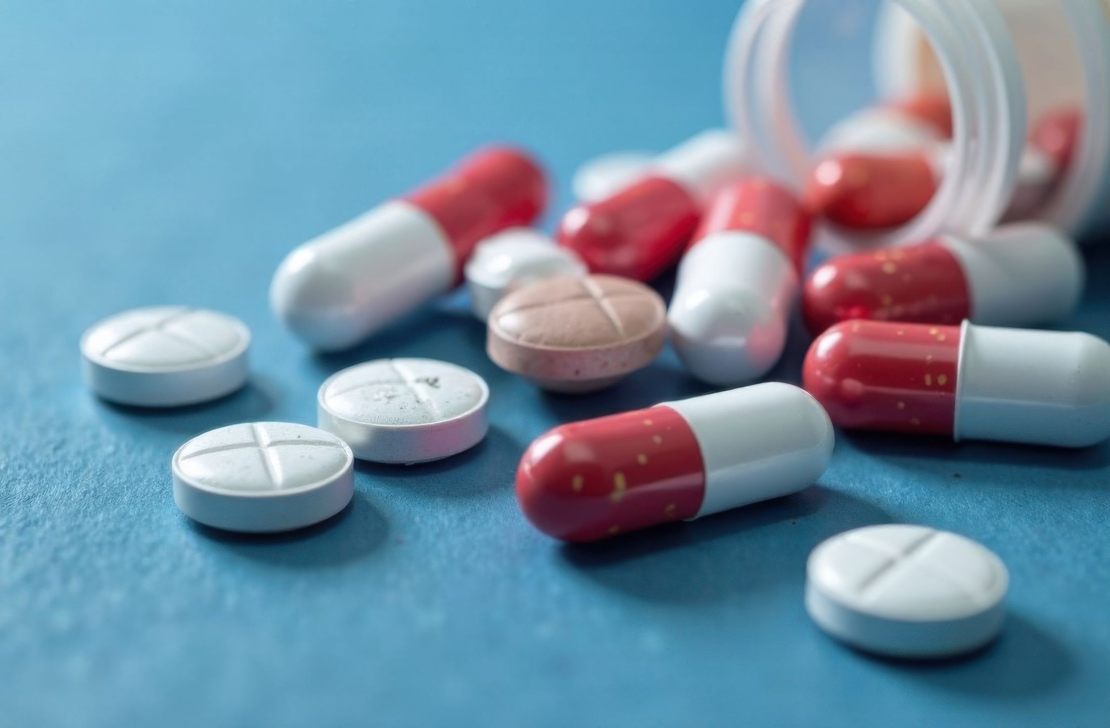 pills, capsules, medication, red, white, healthcare, tablets, pharmaceutical, medicine, treatment, prescription, close-up, therapy, cure, pharmacy, drugs, illness, dose, prevention, health, medical, clinic, hospital, hygiene, care, vitamins, antibiotics, background, colorful, supplements, sterile, nutrition, scattered, concept, relief, science, vibrant, detail