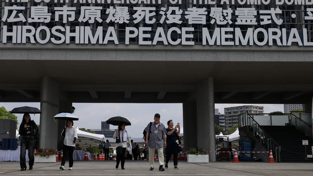 Hiroshima Marks The 80th Anniversary Of Atomic Bomb
HIROSHIMA, JAPAN - AUGUST 05: Visitors walk under a sign marking the 80th anniversary of the atomic bomb attack in World War II at the Hiroshima Peace Memorial on August 05, 2025 in Hiroshima, Japan. On August 6 and 9, 1945, the United States dropped atomic bombs on the Japanese cities of Hiroshima and Nagasaki, bringing unprecedented devastation and loss of life that led to the end of World War II.  (Photo by Buddhika Weerasinghe/Getty Images)
Buddhika Weerasinghe