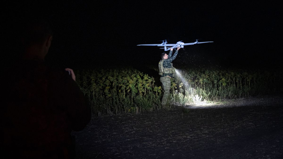 DONETSK REGION, UKRAINE - SEPTEMBER 11: A member of the 1st Special Purpose "Safari" Assault Police Regiment of the Ukrainian National Police handles an American-made 'Vector' reconnaissance drone during a mission to look for Russian forces and logistical facilities on September 11, 2025 in the Donetsk region of Ukraine. (Photo by Ximena Borrazás/Getty Images)