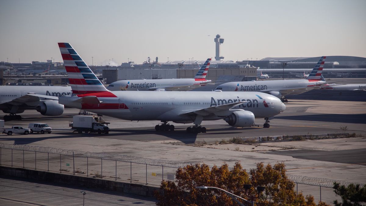 American Airlines airplanes parked at John F. Kennedy International Airport (JFK) ahead of the Thanksgiving holiday in New York, US, on Wednesday, Nov. 23, 2022. Planes and airports are expected to be bustling this Thanksgiving, traditionally one of the most traveled holidays of the year. Photographer: Michael Nagle/Bloomberg via Getty Images