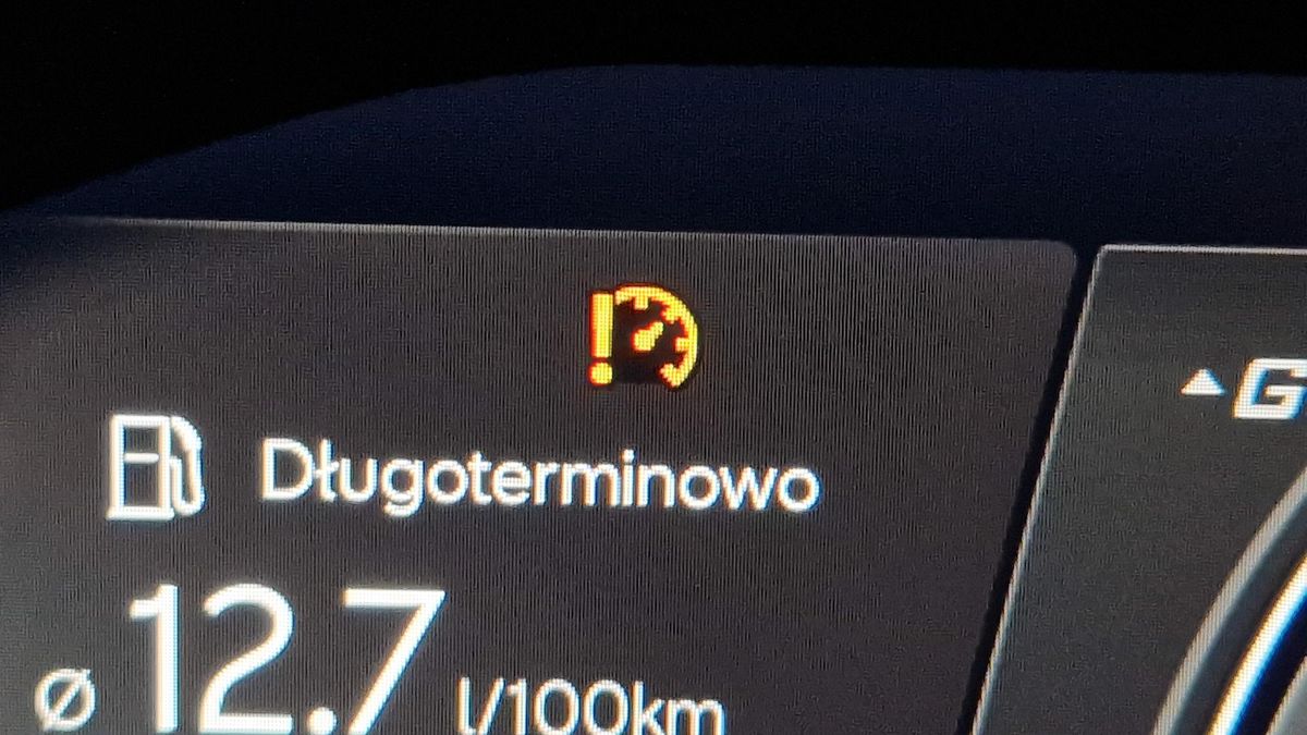 Pomarańczowa kontrolka z wykrzyknikiem