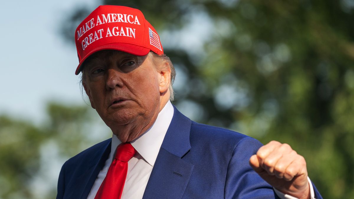 WASHINGTON, DC - JUNE 21: President Donald Trump raises his fist as he returns to the White House prior to a meeting with his National Security Council to discuss the ongoing conflict between Iran and Israel on June 21, 2025 in Washington, DC. (Photo by Craig Hudson For The Washington Post via Getty Images)