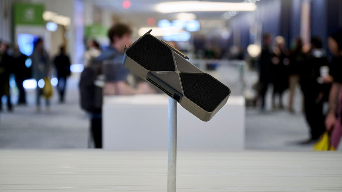 The Nvidia RTX 5090 graphics card during the 2025 CES event in Las Vegas, Nevada, US, on Wednesday, Jan. 8, 2025. People flock to the gambling capital in the tens of thousands to soak up keynote events and fight through the throngs on show floors for a glimpse of some gadget that might be a harbinger of the future. Photographer: Bridget Bennett/Bloomberg via Getty Images