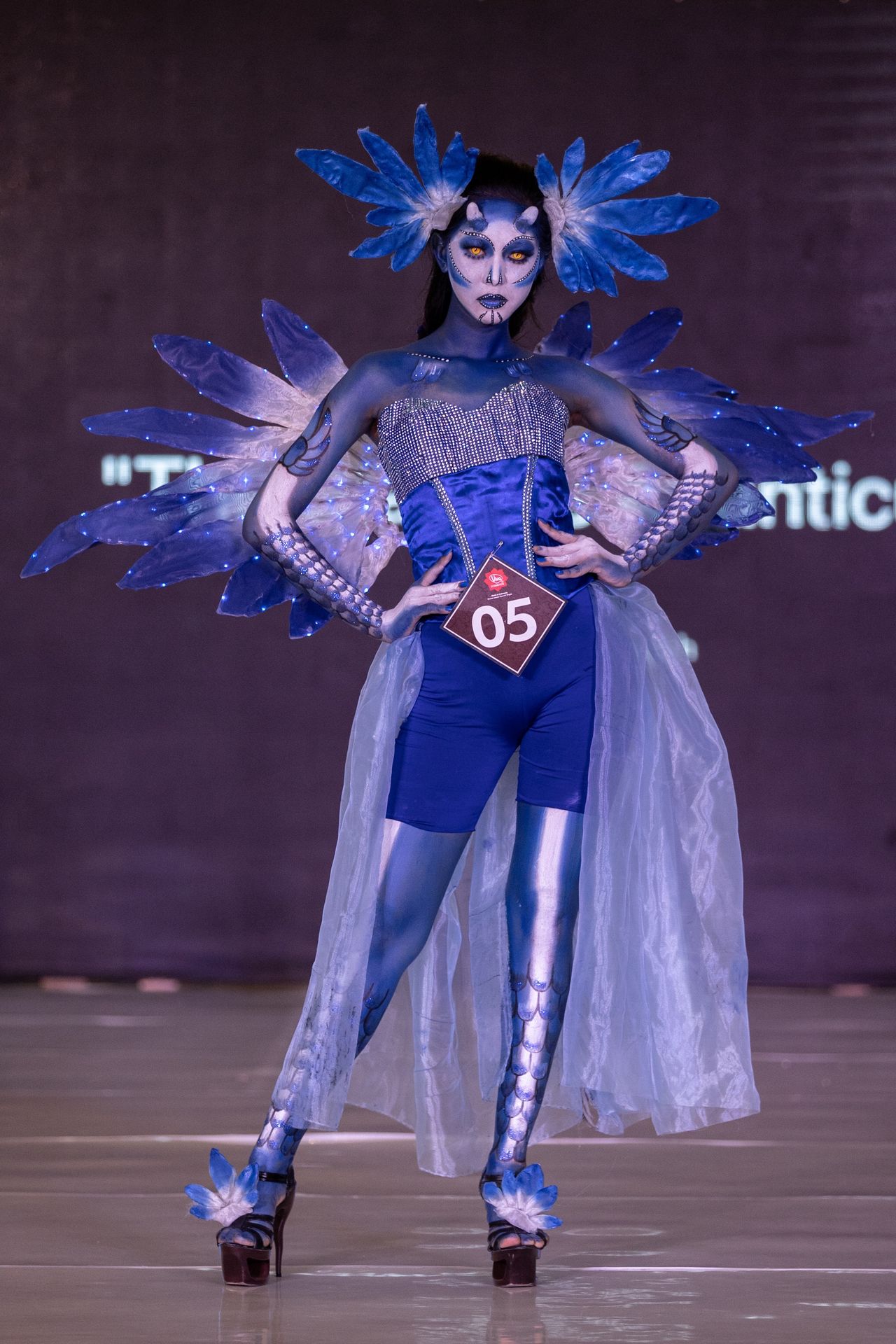 SURABAYA, INDONESIA - JUNE 21: A model showcases designs The Glaucus Atlanticus by Ninda Novianingsih on the runway during the body painting show : Miracle World The Ocean organized by Unipa Surabaya at Grand Atrium Royal Plaza on June 21, 2021 in Surabaya, Indonesia. (Photo by Robertus Pudyanto/Getty Images)