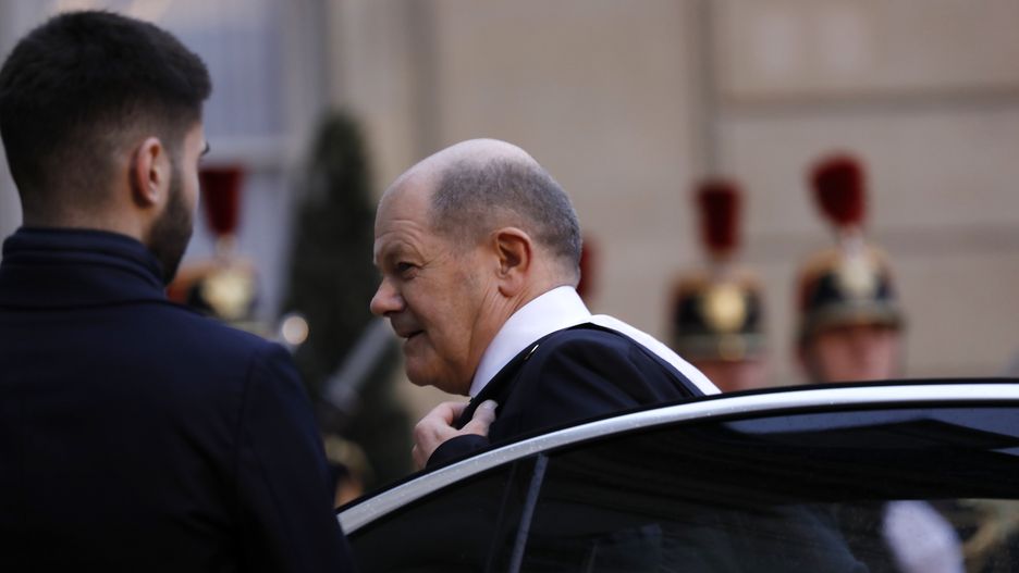 PARIS, FRANCE - FEBRUARY 26: French President Emmanuel Macron welcomes German Chancellor Olaf Scholz as he arrives to attend a conference in support of Ukraine with European leaders and government representatives on February 26, 2024 in Paris, France. February 24 marked two years since Russia's large-scale invasion of Ukraine, an event which galvanized Western Europe on the matter of its collective security.  (Photo by Antoine Gyori - Corbis/Corbis via Getty Images)