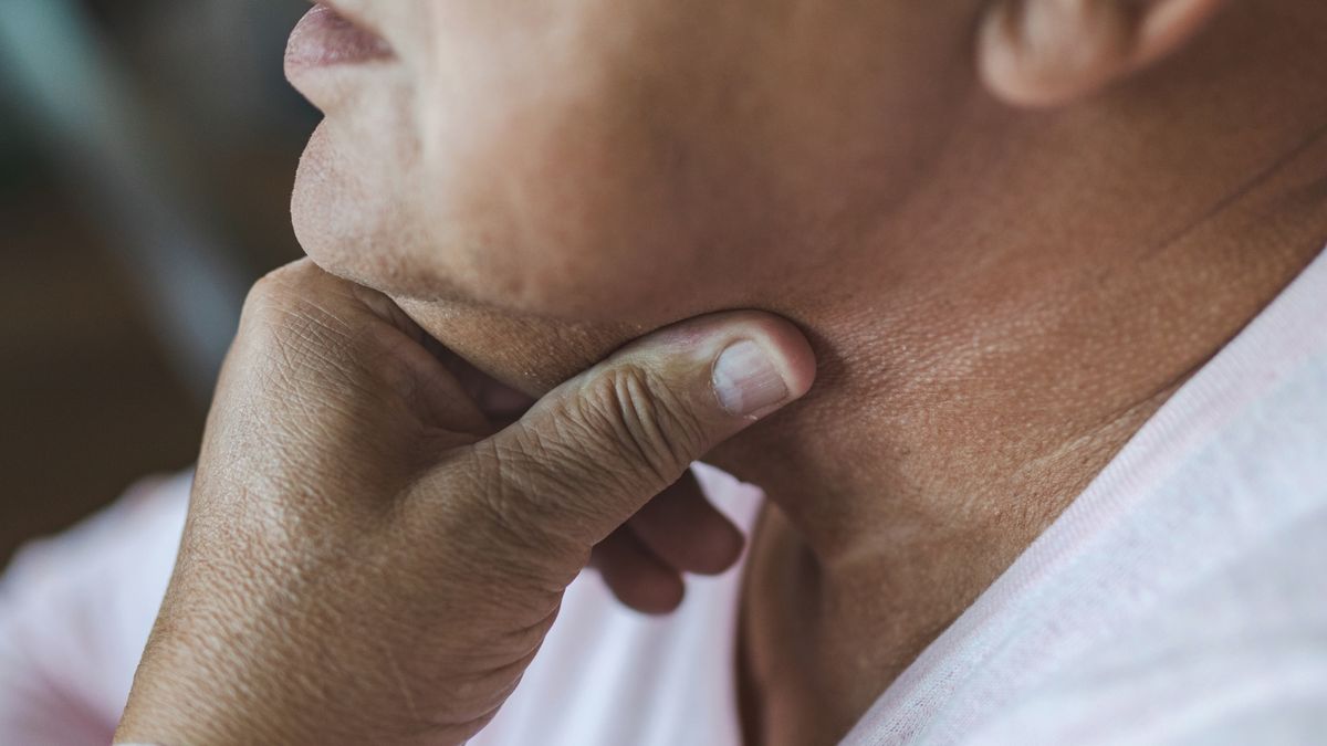 Man With a Sore Throat
Senior man holding neck in pain
vitapix