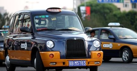 Elektryczne taksówki na ulicach Pekinu