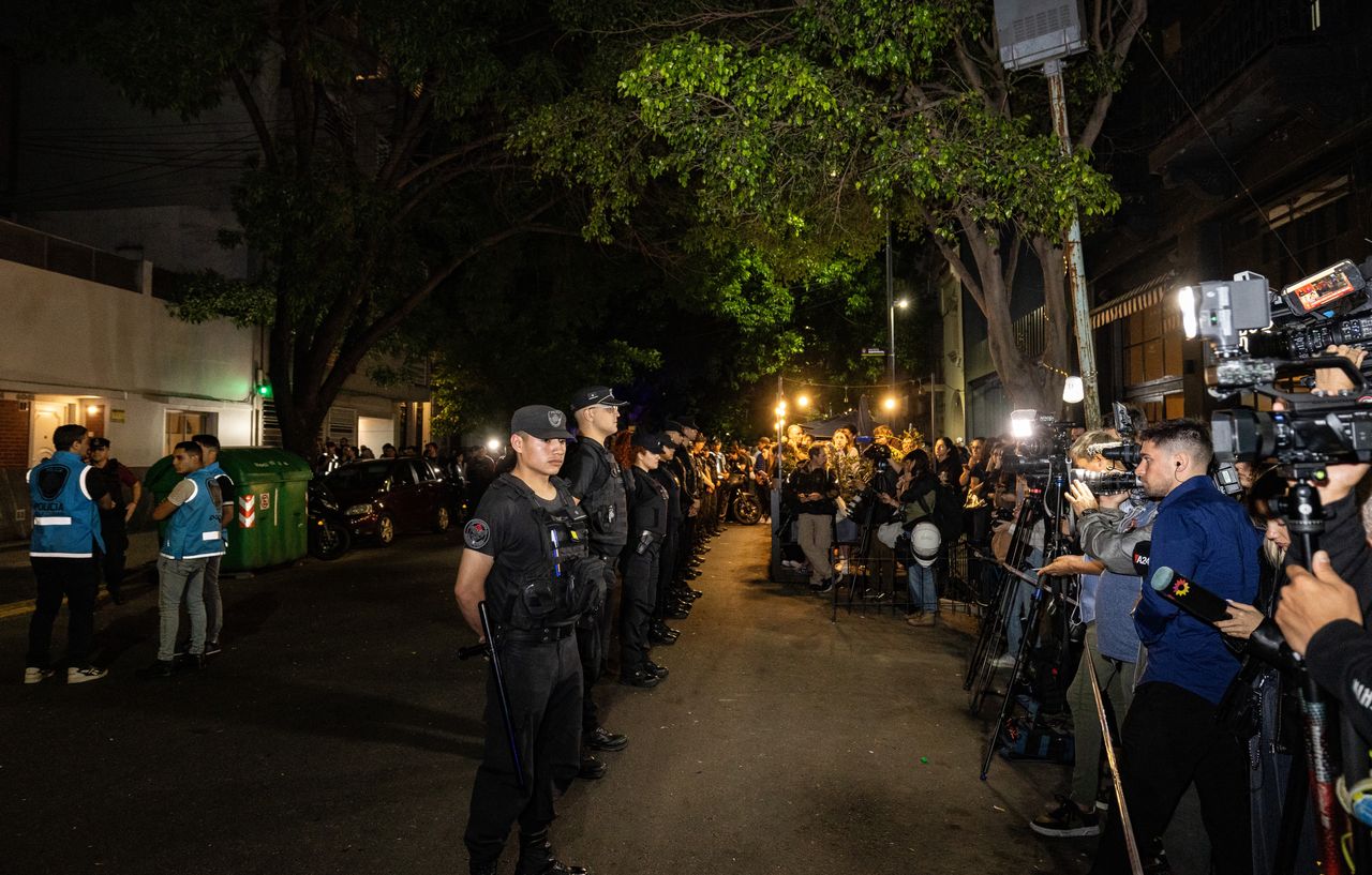 BUENOS AIRES, ARGENTINA - 2024/10/16: Police officers keep away journalists and fans who approached the place after the news. Former One Direction singer Liam Payne falls from the third floor of the Casa Sur hotel in the Palermo neighborhood at 5 p.m. (Photo by Rosana Alvarez Mullner/SOPA Images/LightRocket via Getty Images)