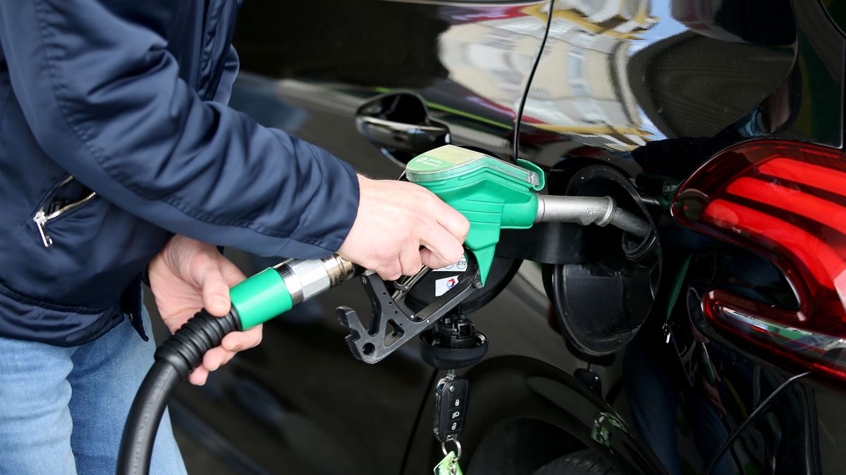 A driver fills up the tank of his car at a Gas station with the new price of fuel exceeding 2 euro per litre due to increases caused by the ongoing Russian invasion of Ukraine, in Lisbon, Portugal, on March 14, 2022. (Photo by Pedro Fiúza/NurPhoto via Getty Images)