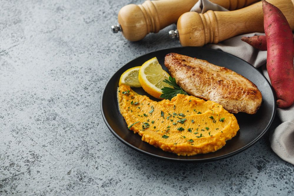 Delicious,Mashed,Sweet,Potatoes,And,Fried,Chicken,Breast,On,A
chicken,batatas,yellow,puree,vegetable,agriculture,red,rustic,slice,potato,root,vegetarian,ingredients,mash,wood,diet,organic,ingredient,yam,asia,health,chiken,vegan,brown,food,fried,meal,orange,wooden,tuber,baked,roasted,edible,ipomoea,tasty,fresh,sweet,breast,crop