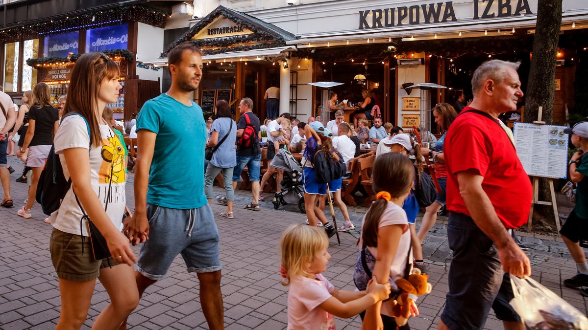 Families walk on a landmark Krupowki Street in the center of Zakopane, a popular Tatra mountain holiday resort on the last weekend of school holiday in Southern Poland on August 30, 2024. (Photo by Dominika Zarzycka/NurPhoto via Getty Images)