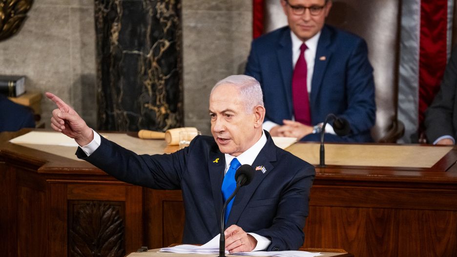 WASHINGTON, DC - JULY 24: Prime Minister of Israel Benjamin Netanyahu addresses a joint meeting of Congress on July 24, 2024 in Washington, DC. House Speaker Mike Johnson looks on in the background. (Photo by Pete Kiehart for The Washington Post via Getty Images)