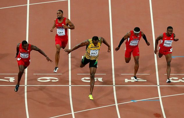 Gatlin przegrywa z Boltem o 0,01 s na MŚ w Pekinie. Fot. Lintao Zhang/Getty Images