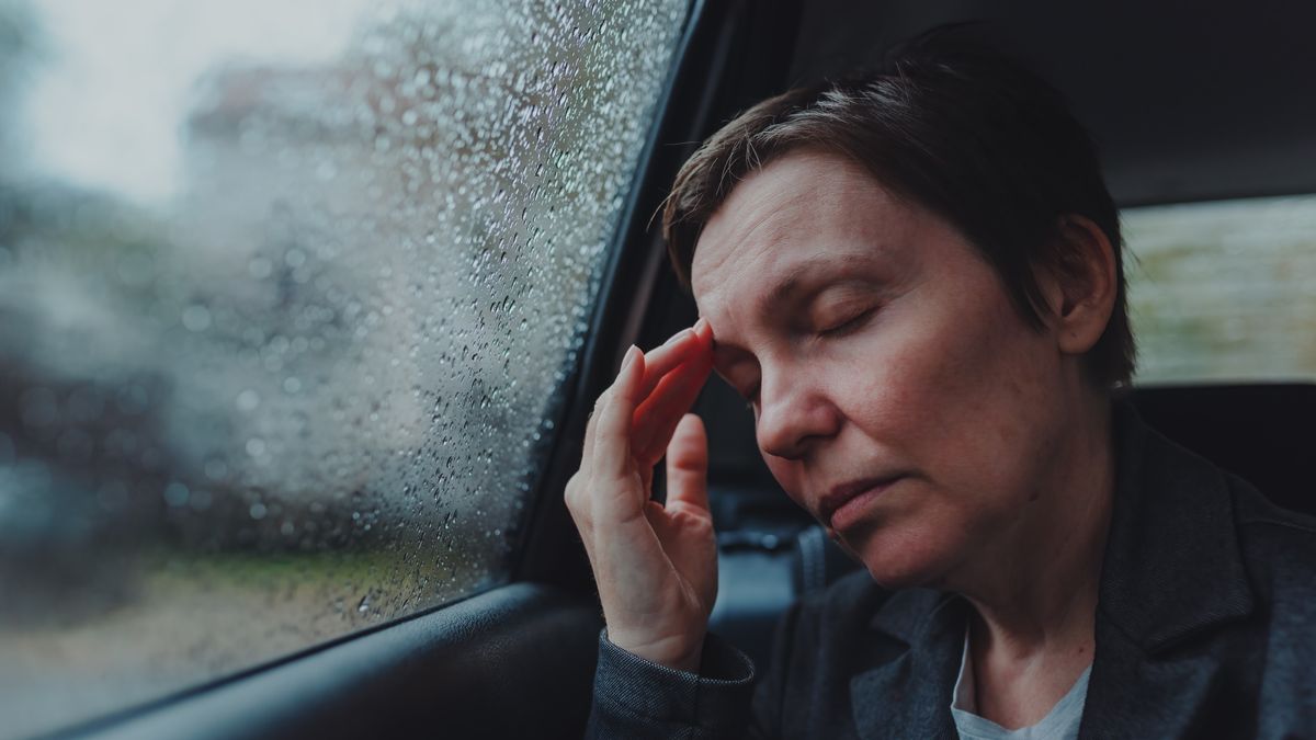 Woman with eyes closed sitting in car,SerbiaBusinesswoman with severe headache sitting at the backseat of a car during rain, selective focusIgor Stevanovic / 500pxsevere, backseat, rainy, migraine, painful, grimace, aching, face, sick, ill, disease, cephalagia, female, vehicle, woman, caucasian, brunette, 40s, auto, automobile, healthcare, transport, tense, concerned, trip, exhausted, health, bad, cold
