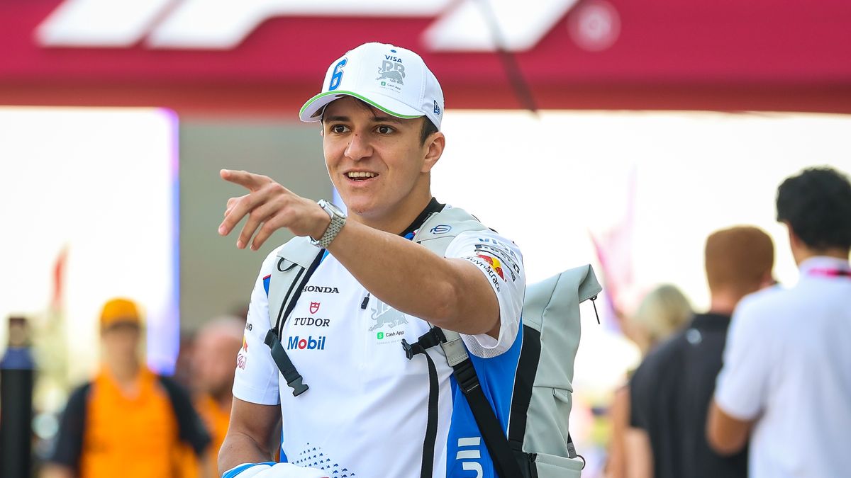 LUSAIL CITY, QATAR - NOVEMBER 30: Isack Hadjar of France and Visa Cash App RB reacts to an incident in the Porsche Cup while he walks in the paddock during the F1 Grand Prix of Qatar at Lusail International Circuit on November 30, 2025 in Lusail City, Qatar. (Photo by Kym Illman/Getty Images)
