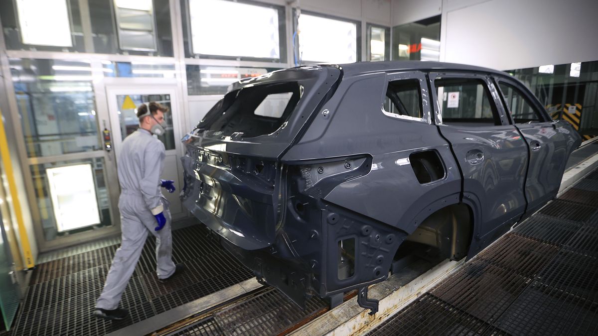 An employee performs quality checks in the paint-shop at the Volkswagen AG factory in Wolfsburg, Germany, on Friday, March 7, 2025. Volkswagen are due to report their full year results on Tuesday, March 11. Photographer: Krisztian Bocsi/Bloomberg via Getty Images