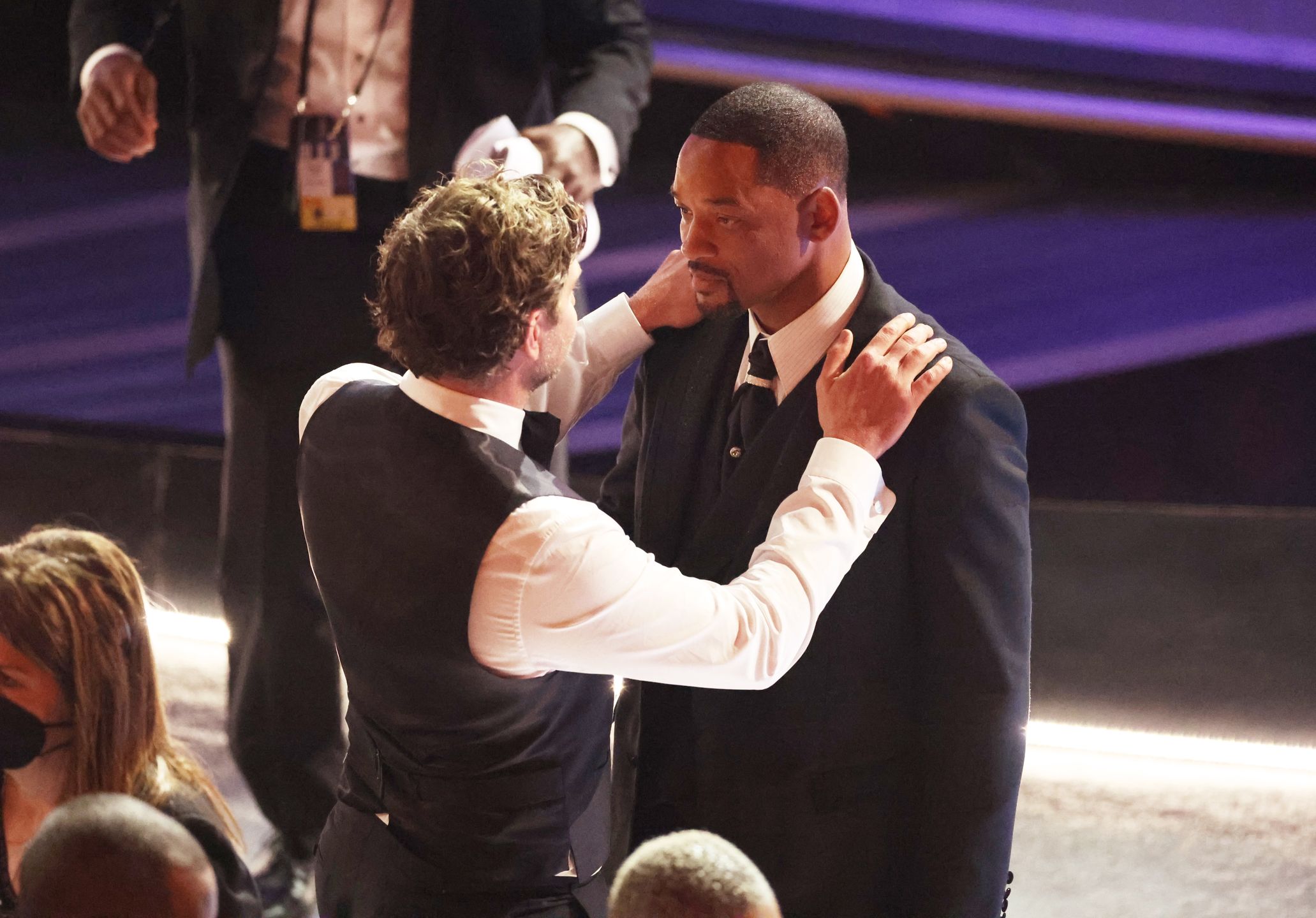 94th Academy Awards - ShowHOLLYWOOD, CA - March 27, 2022.   Bradley Cooper comforts Will Smith  during the show  at the 94th Academy Awards at the Dolby Theatre at Ovation Hollywood on Sunday, March 27, 2022.  (Myung Chun / Los Angeles Times via Getty Images)Myung Chun