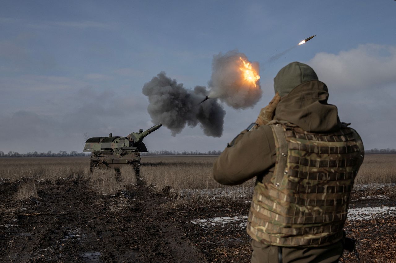 Self-propelled howitzer PzH 2000 in Ukraine firing shells with a rocket booster.