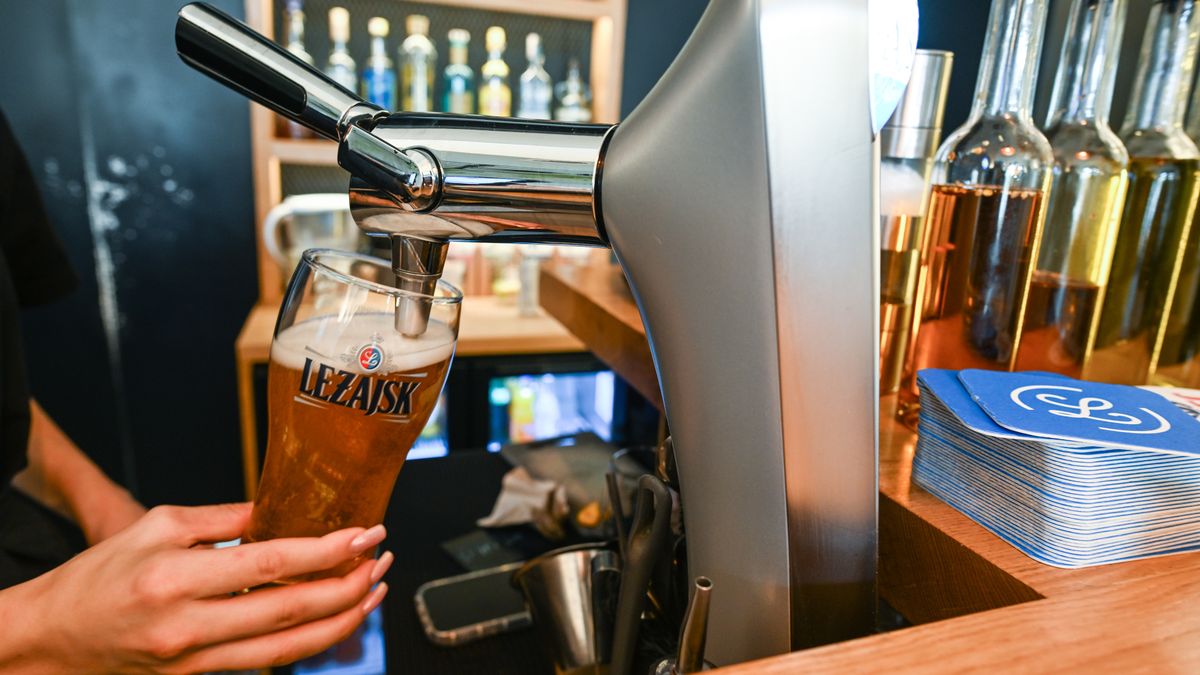 JAROSLAW, POLAND - AUGUST 2:
A bar staff member pouring a pint of local Lezajsk beer, on August 2, 2024, in Jaroslaw, Subcarpathian Voivodeship, Poland. (Photo by Artur Widak/NurPhoto via Getty Images)