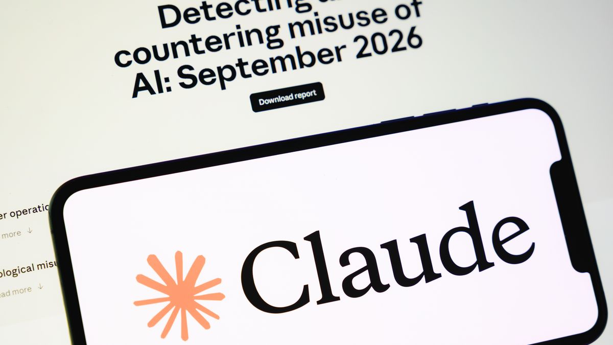 The Claude logo is displayed on a smartphone screen with the webpage of the company's report on malicious use in the background in Creteil, France, on September 11, 2026, as Anthropic announced that it had blocked several accounts that used its artificial intelligence models for research that could contribute to the development of biological weapons. (Photo by Samuel Boivin/NurPhoto via Getty Images)