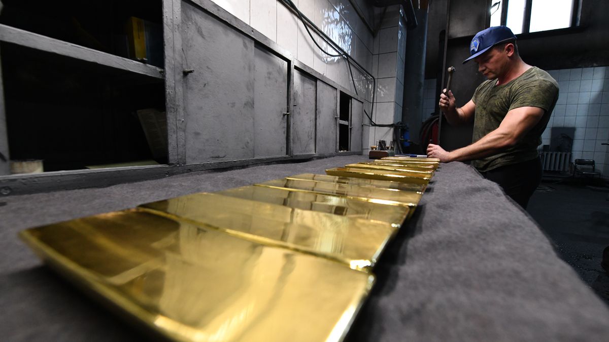 NOVOSIBIRSK, RUSSIA - SEPTEMBER 15: A worker casts ingots of 99.99 percent pure gold at Novosibirsk Refining Plant, Russia's leading gold refining and bar manufacturing plant, in Novosibirsk, Russia on September 15, 2023. The Novosibirsk Refining Plant stands as a prominent refining enterprise in Russia, specializing in the processing of both mineral and secondary raw materials enriched with precious metals. This facility is dedicated to the production of refined gold, silver, and various other precious metals, offering them in diverse forms such as ingots, granules, powder, and more. It also holds the esteemed status of Good Delivery among the six refineries in the Russian Federation. (Photo by Alexander Manzyuk/Anadolu Agency via Getty Images)