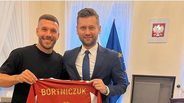 Lukas Podolski i Kamil Bortniczuk