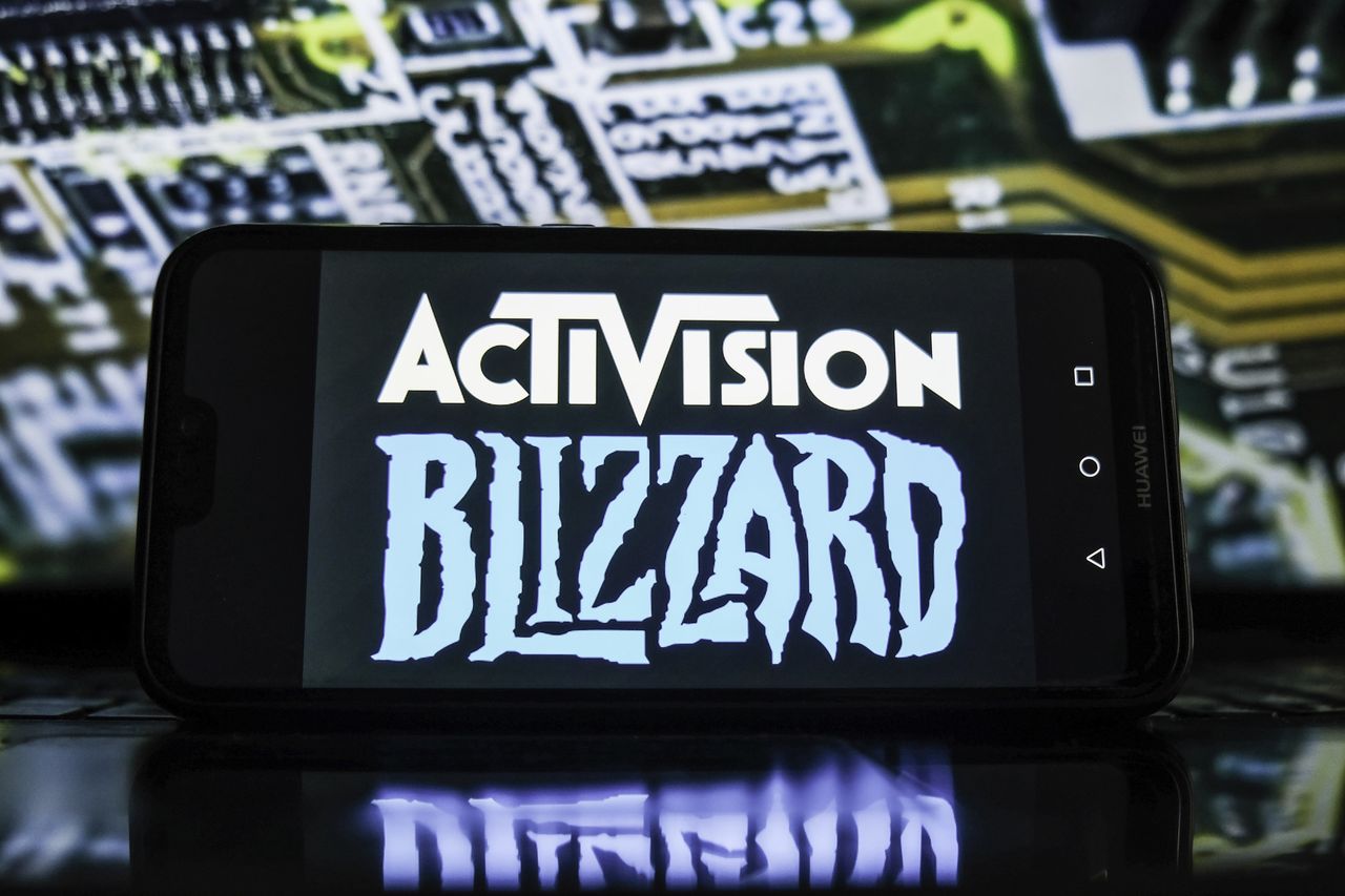 POLAND - 2022/01/21: In this photo illustration, Activision Blizzard logo is displayed on a smartphone. (Photo Illustration by Omar Marques/SOPA Images/LightRocket via Getty Images)