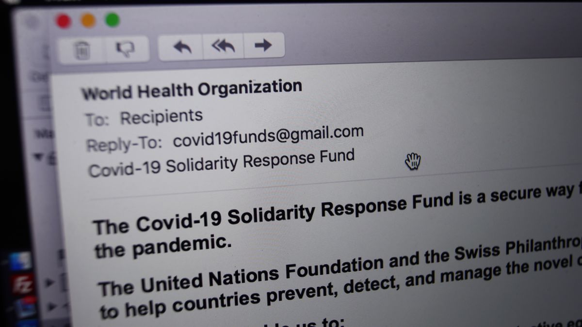 A phishing email from someone posing as the head of the World Health Organization (WHO), and asking recipients to donate money to a coronavirus fund, received on a laptop in London. (Photo by Yui Mok/PA Images via Getty Images)