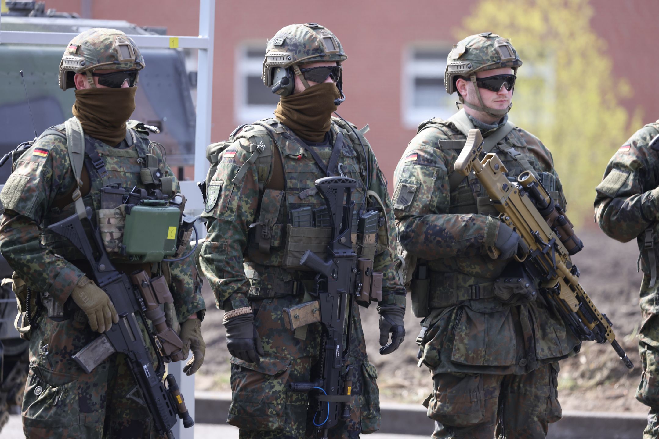 AUGUSTDORF, GERMANY - MARCH 30: Soldiers of the Bundeswehr's Panzerbrigade 21 tank brigade, equipped with  machine guns MG5 with Hensoldt Optics, G36 and others are seen during a visit on March 30, 2022 in Augustdorf, Germany. Elements of Panzerbrigade 21 have participated in Germany military foreign deployments, including in Afghanistan as well as Germany's contingent in Lithuania. The German government, which had long adhered to a bare-bones military policy, announced a radical shift following Russia's February invasion of Ukraine. The new policy includes EUR 100 billion of future military spending and an aggressive modernisation of military hardware. (Photo by Andreas Rentz/Getty Images)