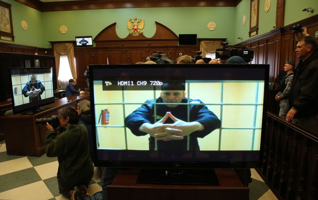 Appeal Hearing Held Over Navalny's 9-Year SentenceMOSCOW, RUSSIA - MAY,24 (RUSSIA OUT) Russian opposition politician, anti-corruption campaigner and founder of the Anti-Corruption Foundation (FBK), Alexey Navalny is seen on the screen during his legal appeal against his nine-year prison sentence, in Moscow's City Court, on May 24, 2022, in Moscow, Russia. Appeal of Kremlin critic Navalny was rejected by the court on Tuesday. (Photo by Contributor/Getty Images)Contributor