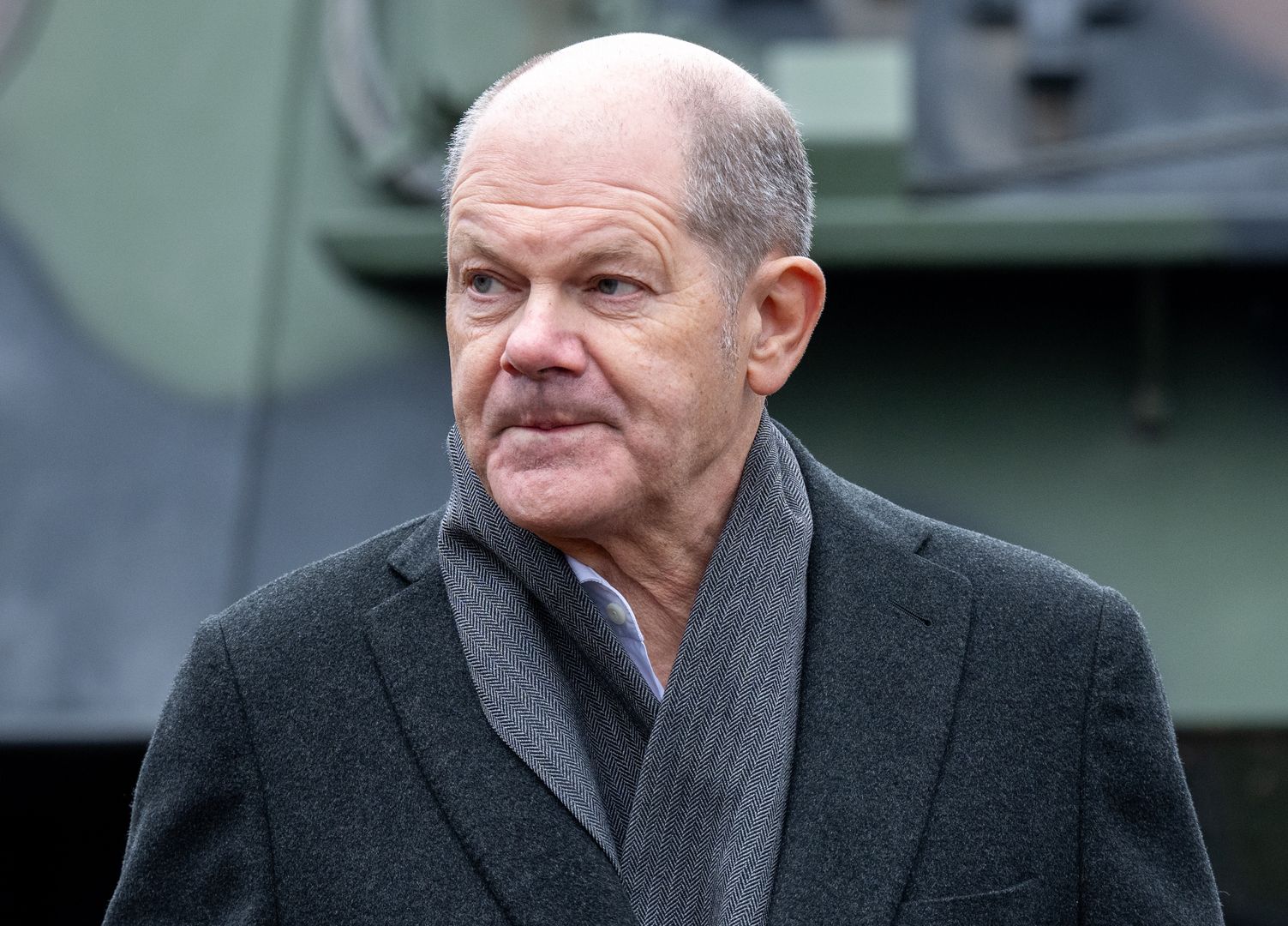UNTERLUESS, GERMANY - FEBRUARY 12:  German Chancellor Olaf Scholz after the groundbreaking ceremony for a new munitions factory of German defence contractor Rheinmetall on February 12, 2024 in Unterluess, Germany. The war in Ukraine has been a boon to Rheinmetall as Germany seeks to provide Ukraine with munitions, including artillery shells, and also increase its own supply. (Photo by David Hecker/Getty Images)