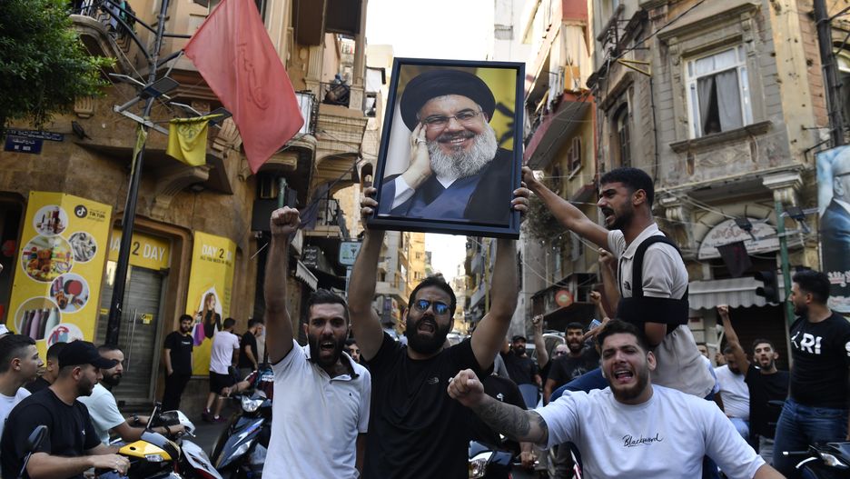 Hezbollah says Secretary General Hassan Nasrallah killed in yesterday's Israeli attack in Beirut
BEIRUT, LEBANON - SEPTEMBER 28: A group gather carrying Nasrallah's poster and chanting slogans following Hezbollah's statement after Hezbollah Secretary General Hassan Nasrallah was killed yesterday in Israeli airstrikes in Beirut, Lebanon on September 28, 2024. (Photo by Houssam Shbaro/Anadolu via Getty Images)
Anadolu
demonstration, lebanon