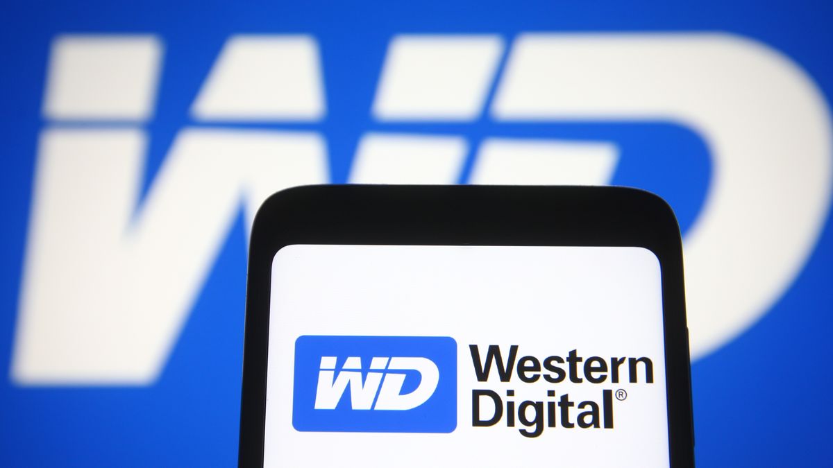 UKRAINE - 2021/04/20: In this photo illustration a Western Digital (WD) logo is seen on a smartphone and a pc screen. (Photo Illustration by Pavlo Gonchar/SOPA Images/LightRocket via Getty Images)