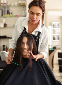 Hairdressers as psychologists? African NGOs have an idea