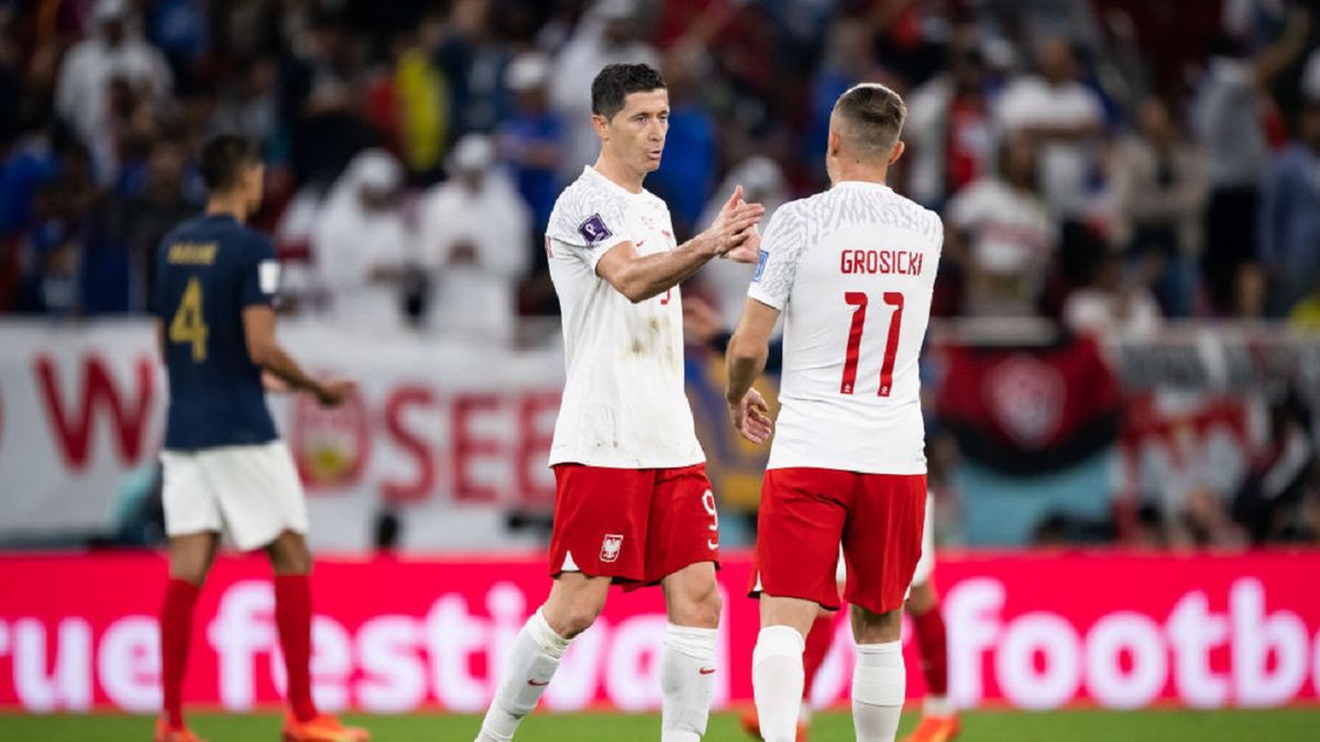 Getty Images /  Marvin Ibo Guengoer - GES Sportfoto / Na zdjęciu: Robert Lewandowski i Kamil Grosicki