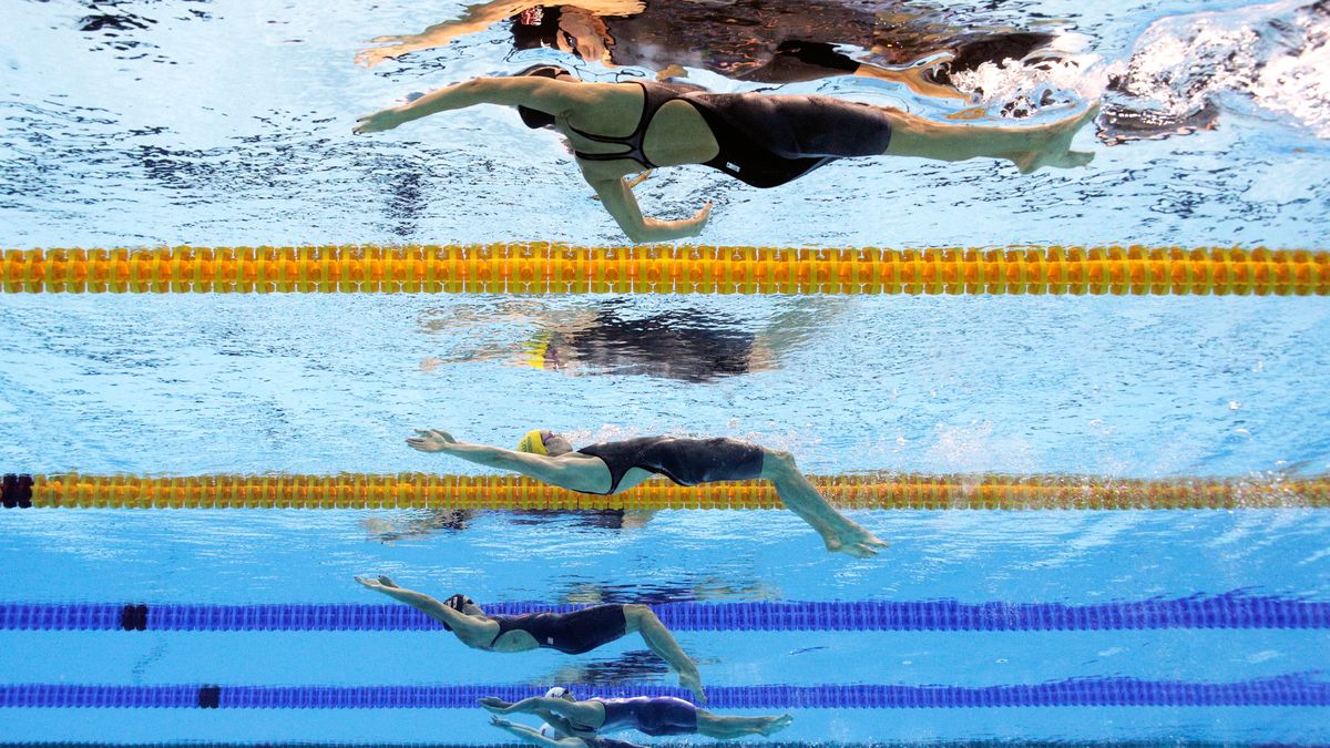 Swimming - Olympics: Day 2RIO DE JANEIRO, BRAZIL - AUGUST 07:  (From top) Mie Nielsen of Denmark, Emily Seebohm of Australia, Olivia Smoliga of the United States, Anastasiia Fesikova of Russia and Xueer Wang of China compete in the first Semifinal of the Women's 100m Backstroke on Day 2 of the Rio 2016 Olympic Games at the Olympic Aquatics Stadium on August 7, 2016 in Rio de Janeiro, Brazil.  (Photo by Adam Pretty/Getty Images)Adam Pretty