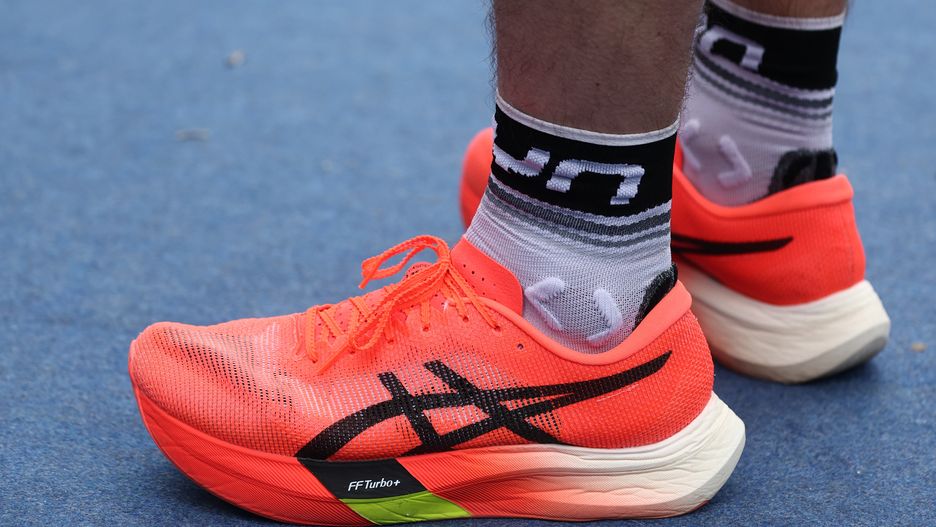 Asics Metaspeed Sky Paris U shoes wearing by a runner are seen during Cracovia Maraton in Krakow, Poland on April 6, 2025. (Photo by Jakub Porzycki/NurPhoto via Getty Images)