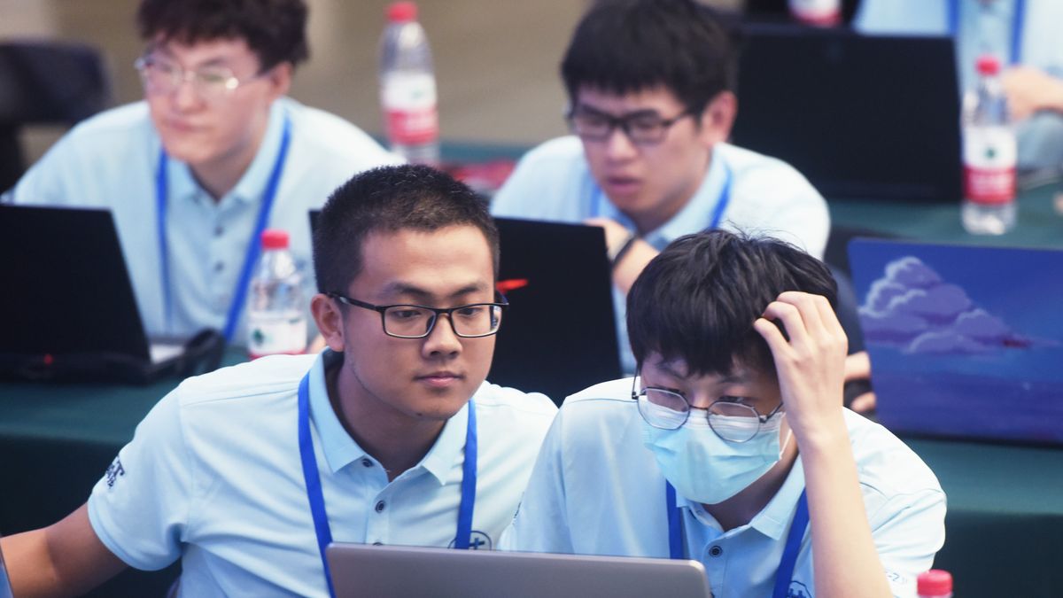 HANGZHOU, CHINA - AUGUST 2, 2022 - College students majoring in integrated circuits from universities across the country participate in a competition of related integrated circuit (chip) design ability at Zhejiang University Hangzhou International Science Innovation Center in Hangzhou, Zhejiang province, China, Aug 2, 2022. (Photo credit should read CFOTO/Future Publishing via Getty Images)