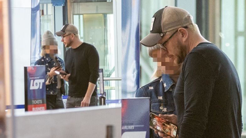 Filip Chajzer z ukochaną na lotnisku