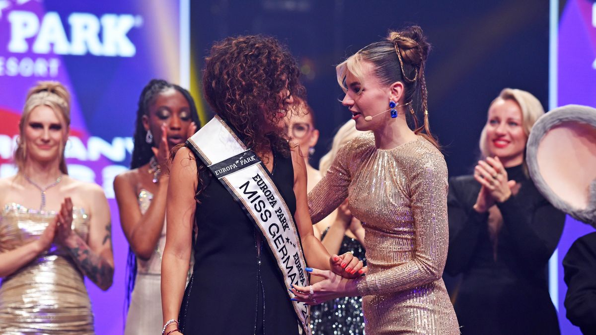 RUST, GERMANY - FEBRUARY 24:  Miss Germany 2024 Apameh Api Schönauer and Miss Germany 2023 Kira Geiss on stage at the Miss Germany Contest 2024 Finals at Europa-Park on February 24, 2024 in Rust, Germany. (Photo by Tristar Media/Getty Images)